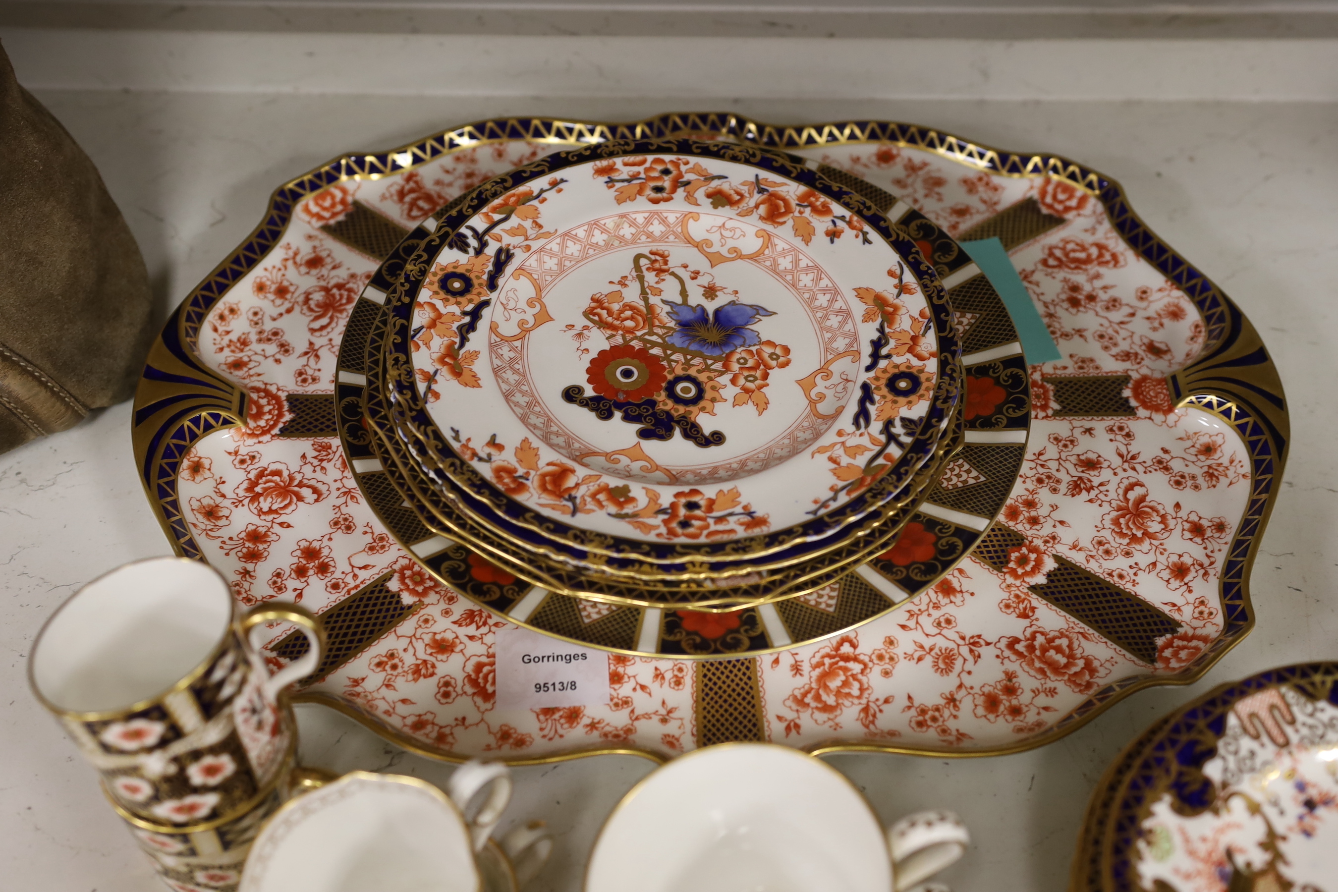 A collection of Royal Crown Derby tea and coffee wares to include a tray